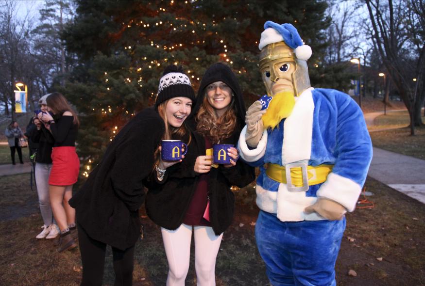 students and gus at tree lighting