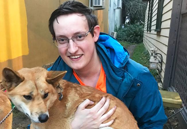 Ryan Johnson didnt spend all of his time with marine animals. Here he holds an Australian dingo. 